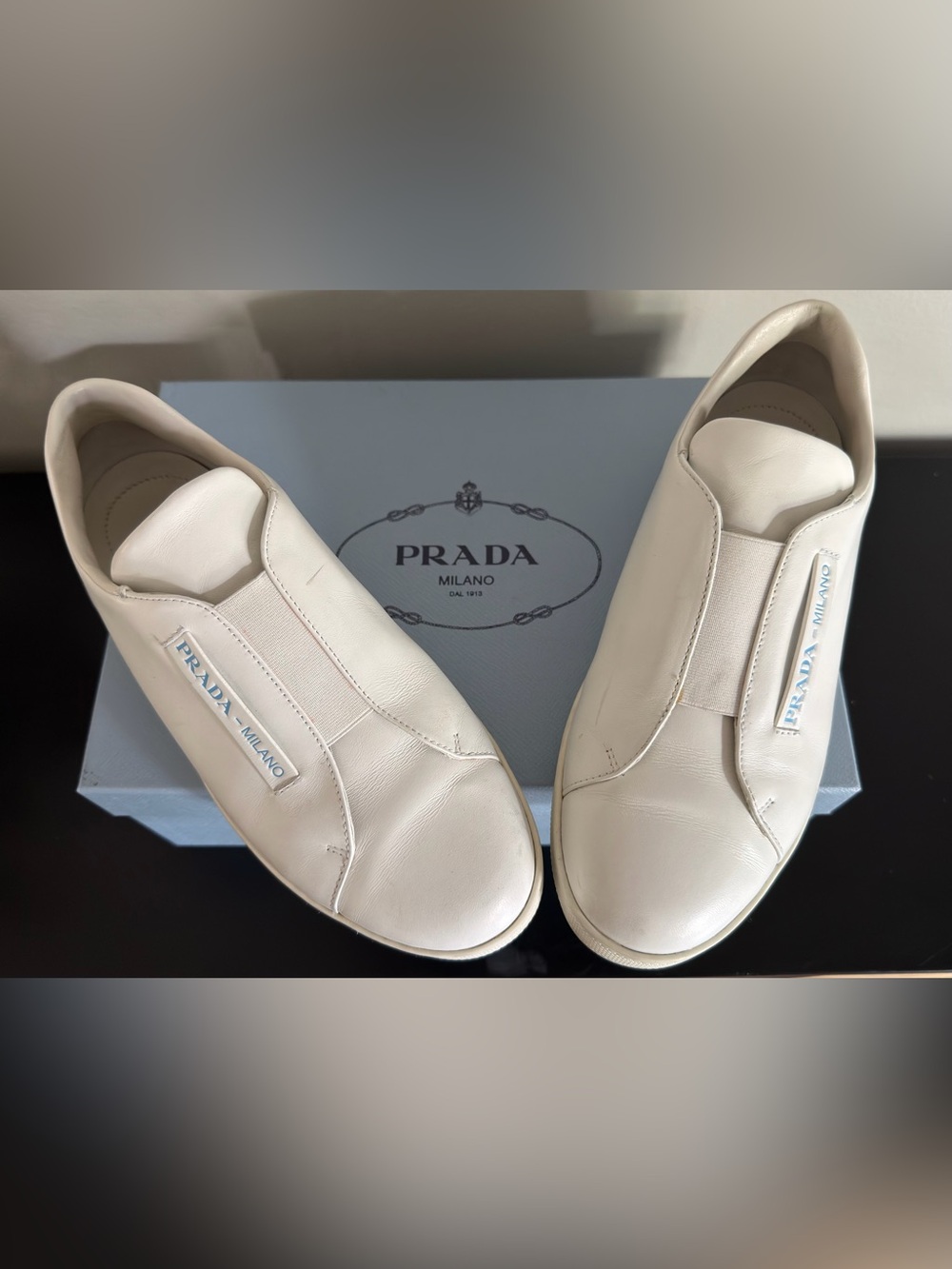 Prada women slip on leather sneakers size 37 US size 7